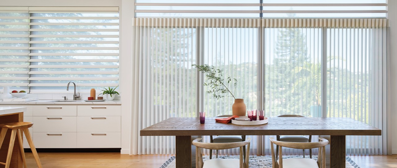 Sliding glass kitchen doors featuring Luminette® Privacy Sheers and Pirouette® Window Shadings; Fabric: Stria  Color: Sand Shimmer